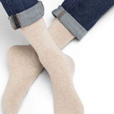 Model wearing Wool Cashmere Socks Mid Cordage by Bleuforêt, available at The Foundation, showing soft beige cashmere blend socks for warmth and comfort.