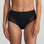 Model in Marie Jo Jane Full Brief in Black from The Foundation, featuring full coverage, sheer floral embroidery, and a front bow with pearl detail. front view