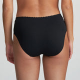 Model in Marie Jo Jane Full Brief in Black from The Foundation, featuring full coverage, sheer floral embroidery, and a front bow with pearl detail. back view