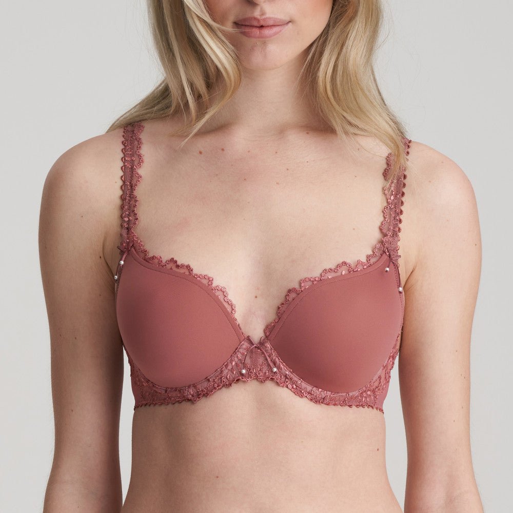 Model wearing Marie Jo Jane Padded Heart Shape Bra in Red Copper from The Foundation, featuring embroidered cups, plunge fit, and adjustable straps. close up