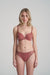 Model wearing Marie Jo Jane Padded Heart Shape Bra in Red Copper from The Foundation, featuring embroidered cups, plunge fit, and adjustable straps.