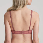 Model wearing Marie Jo Jane Padded Heart Shape Bra in Red Copper from The Foundation, featuring embroidered cups, plunge fit, and adjustable straps. back view