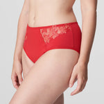 Model wearing PrimaDonna Deauville Full Brief in Scarlet from The Foundation, featuring high waist fit, smoothing support, and lace detail at the hips. side view