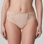 Model wearing PrimaDonna Madison Full Brief in Café Latte from The Foundation, with gingham fabric, lace sides, and high-waist full coverage.