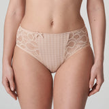 Model wearing PrimaDonna Madison Full Brief in Café Latte from The Foundation, with gingham fabric, lace sides, and high-waist full coverage.