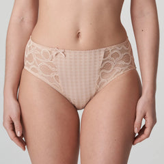 Model wearing PrimaDonna Madison Full Brief in Café Latte from The Foundation, with gingham fabric, lace sides, and high-waist full coverage.