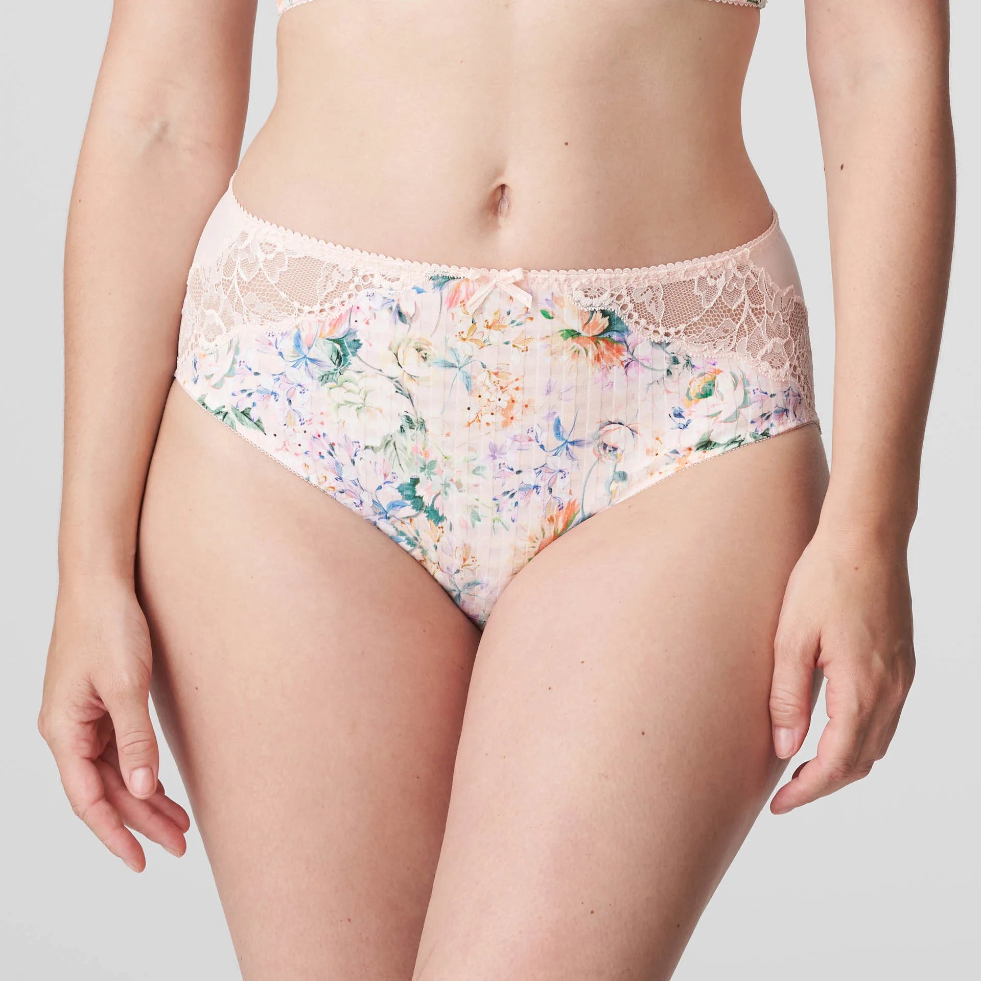 Model in PrimaDonna Madison Full Brief Lace Back in Pink Diamond from The Foundation, featuring floral gingham print and lace-wrapped back. front view