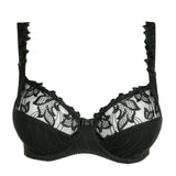 Front-facing image of the Deauville black lace bra styled with matching bottoms—The Foundation