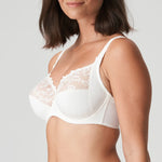 Model wearing PrimaDonna Deauville Full Cup Bra in Natural from The Foundation, featuring deep supportive cups and elegant embroidered detailing. side view