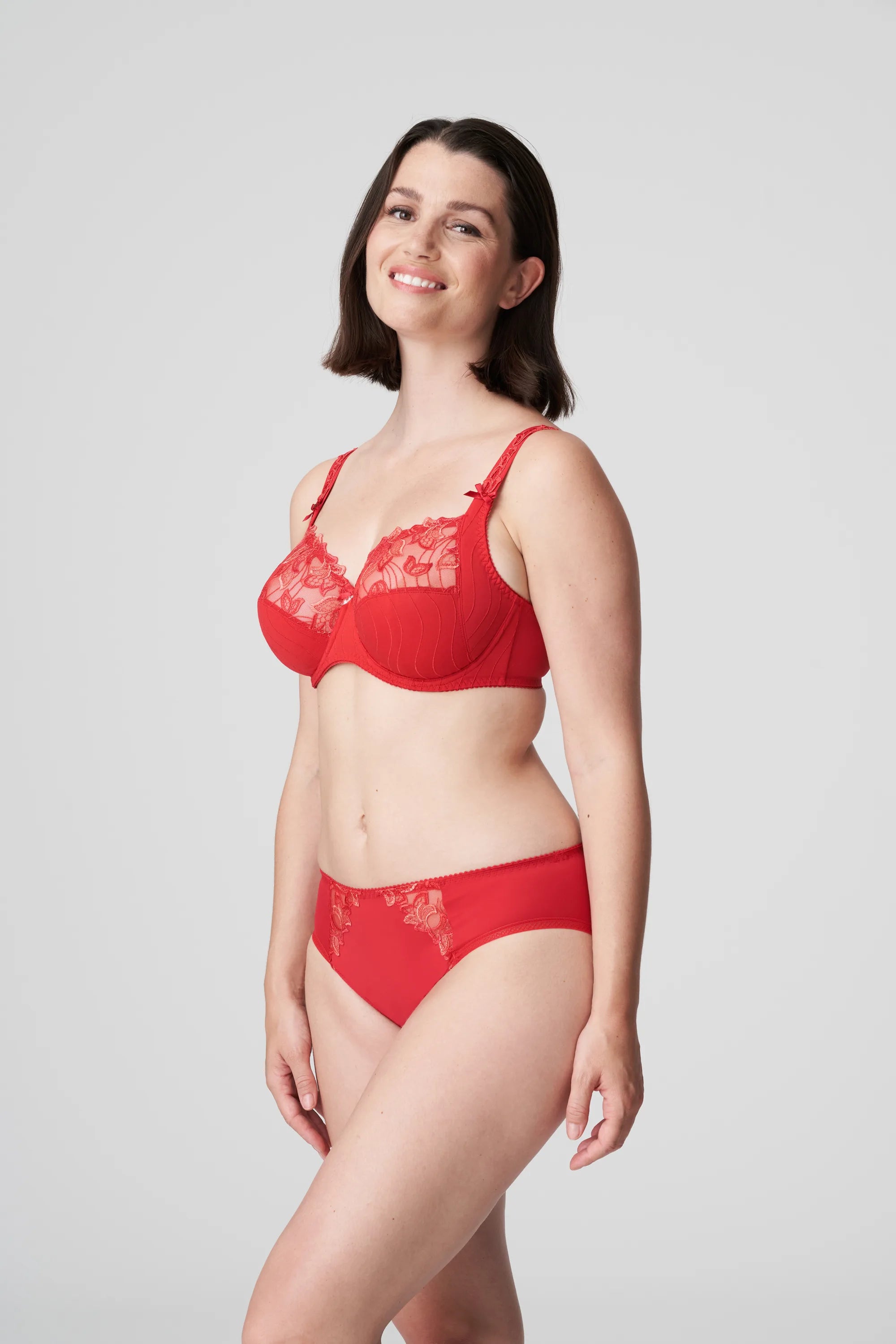 Side view of the Deauville Full Cup Bra Scarlet worn by model from The Foundation, offering a full-body glimpse of the fit and design.