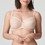 Model wearing PrimaDonna Deauville Full Cup Bra in Café Latte from The Foundation, with embroidered cups, side support, and a flattering fit. close up