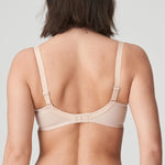 Model wearing PrimaDonna Deauville Full Cup Bra in Café Latte from The Foundation, with embroidered cups, side support, and a flattering fit. back view