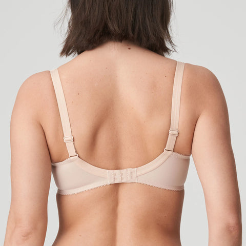 Model wearing PrimaDonna Deauville Full Cup Bra in Café Latte from The Foundation, with embroidered cups, side support, and a flattering fit. back view