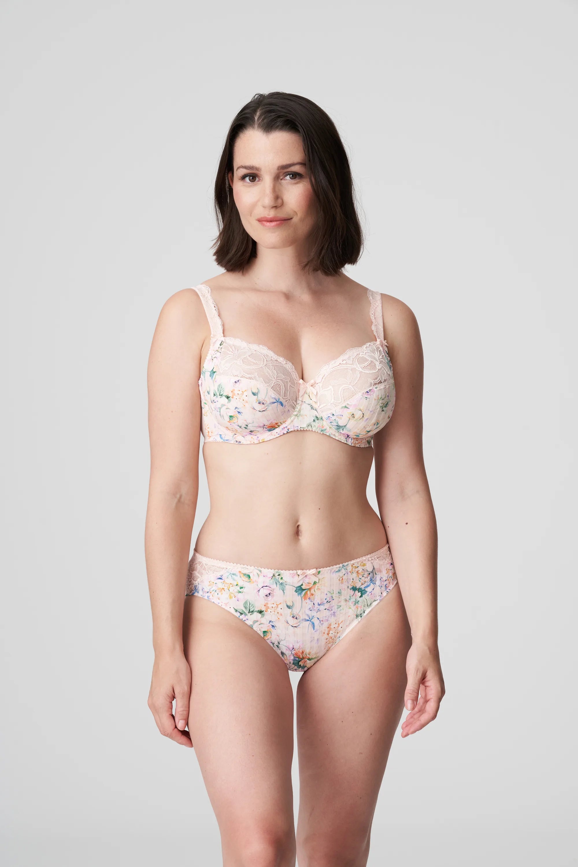 Model wearing PrimaDonna Madison Full Cup Bra in Pink Diamond with pastel floral lace—The Foundation