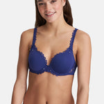 Model wearing Marie Jo Jane Padded Heart Shape Bra in Lazurite Blue from The Foundation, with embroidered cups, plunge neckline, and convertible straps. 