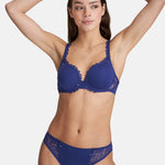 Model wearing Marie Jo Jane Padded Heart Shape Bra in Lazurite Blue from The Foundation, with embroidered cups, plunge neckline, and convertible straps. front view