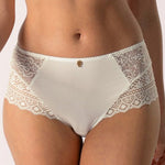 Close up of Empreinte Cassiopee Culotte Brief in Silk, featuring delicate lace panels and soft ivory fabric.