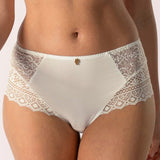 Close up of Empreinte Cassiopee Culotte Brief in Silk, featuring delicate lace panels and soft ivory fabric.