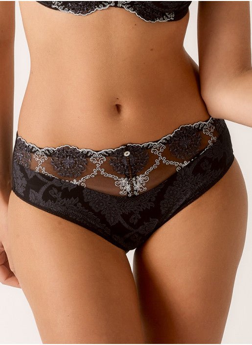 Close up of Empreinte Lilly Rose Culotte Brief in black, featuring sheer floral embroidery and scalloped lace detailing.