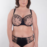 Model in Perla Midi Brief Black paired with Perla Soft High Apex Bra – front view – The Foundation