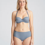 Model wearing Avero Full Brief Atlantic Blue with matching bra, styled as a lingerie set by Marie Jo.