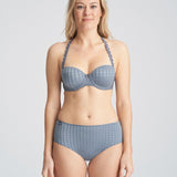 Model wearing Avero Full Brief Atlantic Blue with matching bra, styled as a lingerie set by Marie Jo.