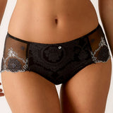 Close up of Empreinte Lilly Rose Shorty Brief in black, featuring floral embroidered lace and opaque woven centre panel.